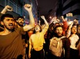 Demonstrators shout anti-government slogans during a protest against the High Election Board (YSK) decision to re-run the mayoral election, in Istanbul
