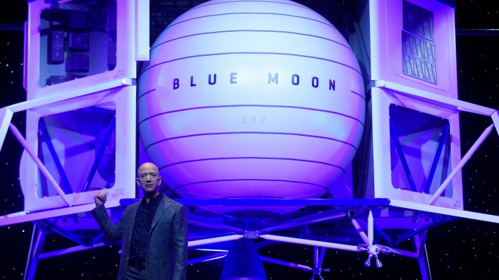 Founder, Chairman, CEO and President of Amazon Jeff Bezos unveils his space company Blue Origin's space exploration lunar lander rocket called Blue Moon during an unveiling event in Washington