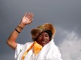 FILE PHOTO: Kami Rita Sherpa, 48, a Nepali mountaineer waves towards the media personnel upon his arrival after climbing Mount Everest for a 22nd time, creating a new record for the most summits of the worldÕs highest mountain, in Kathmandu