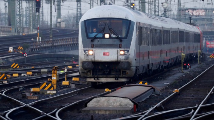 FILE PHOTO: A locomotive engine of German railway Deutsche Bahn is seen at the main train station in Frankfurt