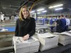 Guardian editor-in-chief Katharine Viner holds the first edition of the new tabloid Guardian at its new printing site, Trinity Mirror Printing in Watford.