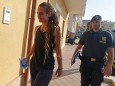 Carola Rackete, the 31-year-old Sea-Watch 3 captain is seen arriving at the Finance police headquarters in Lampedusa