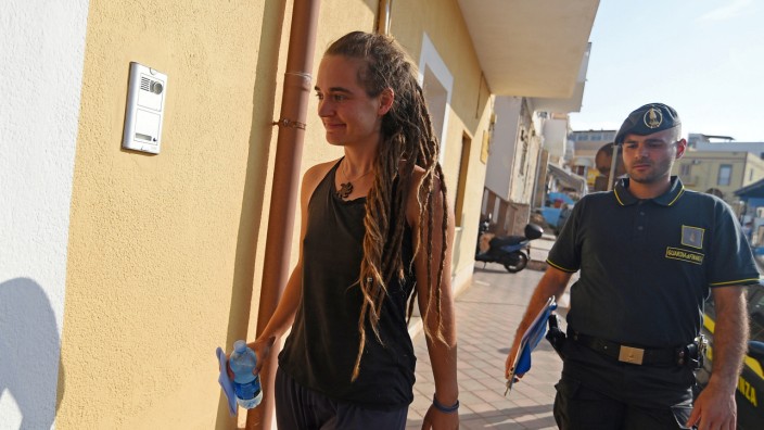 Carola Rackete, the 31-year-old Sea-Watch 3 captain is seen arriving at the Finance police headquarters in Lampedusa