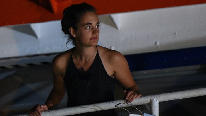 Carola Rackete, the 31-year-old Sea-Watch 3 captain, is seen onboard the ship as it docks in Lampedusa