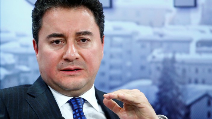 FILE PHOTO: Turkish Deputy Prime Minister Babacan gestures during the session 'Growing in Harder Times' in the Swiss mountain resort of Davos