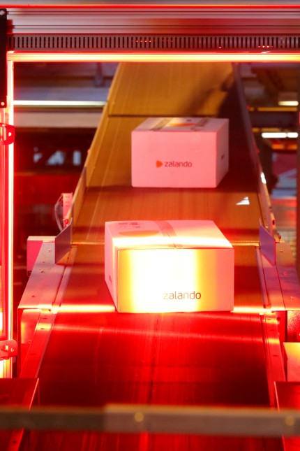 FILE PHOTO: Zalando boxes going through the Swiss Post parcel distribution centre in Frauenfeld