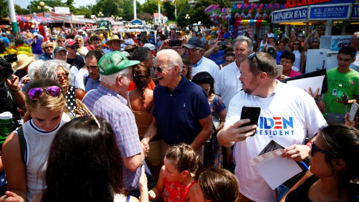 Democratic 2020 U.S. presidential candidate and former U.S. Vice President Joe Biden interacts with people at the Iowa State Fair in Des Moines