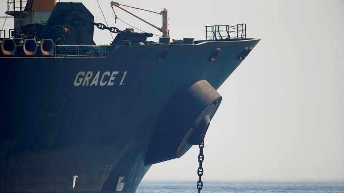 FILE PHOTO: Iranian oil tanker Grace 1 sits anchored after it was seized in July by British Royal Marines off the coast of the British Mediterranean territory, in the Strait of Gibraltar