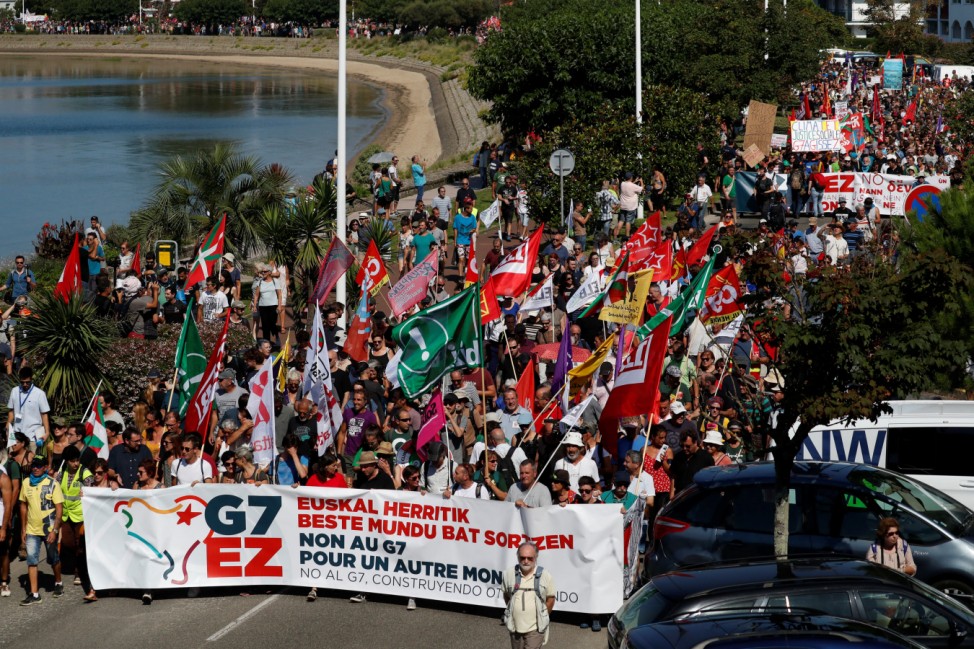 G7 opponents attend a protest in Hendaye