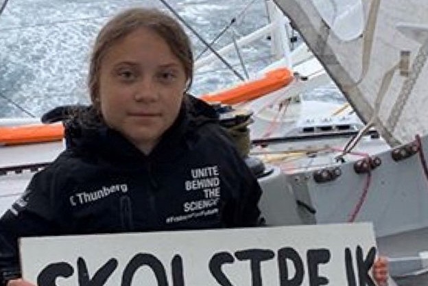 Swedish climate activist Greta Thunberg sits aboard Team Malizia yacht