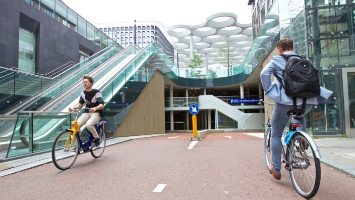 190820 THE HAGUE Aug 20 2019 People ride at a new bicycle parking facility in Utrecht t
