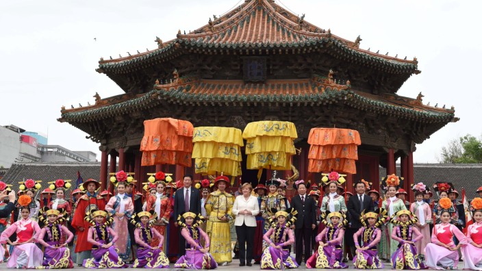 160614 SHENYANG June 14 2016 German Chancellor Angela Merkel poses for a group photo with