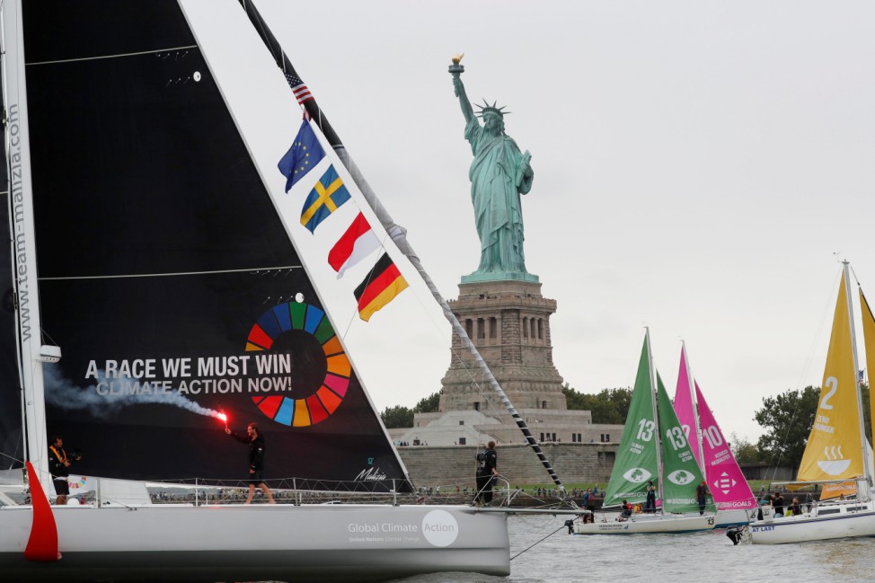 Swedish 16-year-old activist Greta Thunberg sails past the Statue of Liberty on the Malizia II racing yacht in New York Harbor