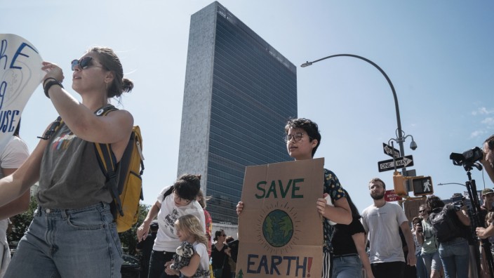 Teenage climate activist Greta Thunberg joins protest outside UN
