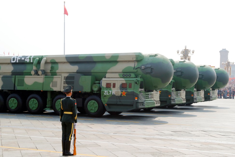 Military vehicles carrying DF-41 intercontinental ballistic missiles travel past Tiananmen Square during the military parade marking the 70th founding anniversary of People's Republic of China