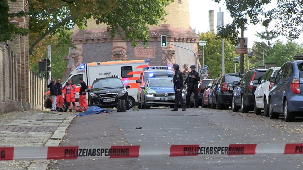 Police secures the area after a shooting in the eastern German city of Halle