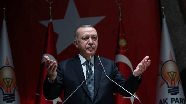 Turkish President Erdogan attends a meeting of his ruling AKP in Ankara