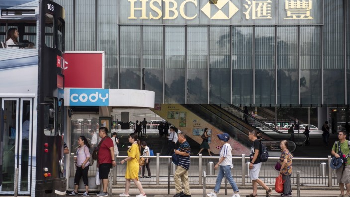 September 17, 2019, Hong Kong, China: Pedestrians walk past a British multinational banking and financial services holdi