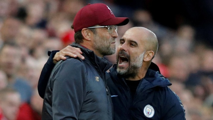 Premier League: Die Trainer Jürgen Klopp (FC Liverpool) und Pep Guardiola (Manchester City)