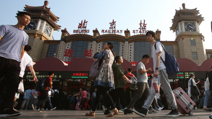September 30, 2019, Beijing, China: Beijing Railway Station is crowded with travelers and passenger who are going home d