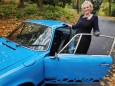 Porsche Carrera mit blonder Frau