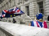 July 30 2019 London United Kingdom An anti Brexit demonstrator waves an EU and a Union flag as M