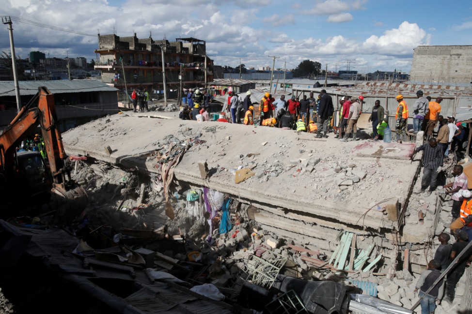 Rescue teams search the scene where a building collapsed in Nairobi