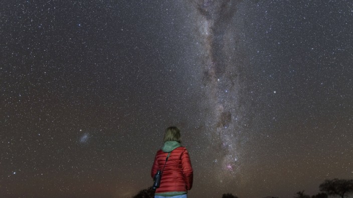 Namibia Region Khomas near Uhlenhorst Astrophoto Stargazing woman observing the Southern Cross e