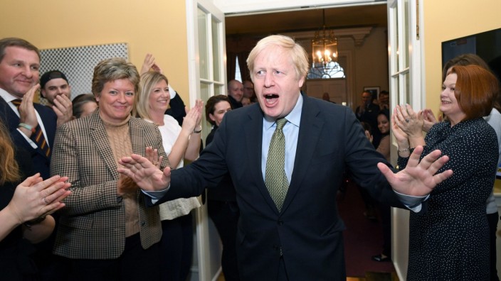 Britain's Prime Minister Boris Johnson returns to Downing Street, London