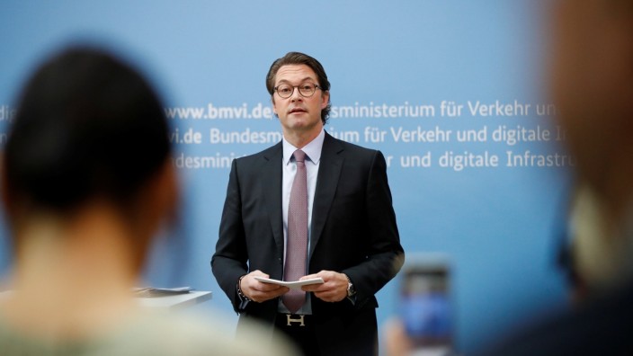 German Transport Minister Andreas Scheuer addresses a news conference in Berlin