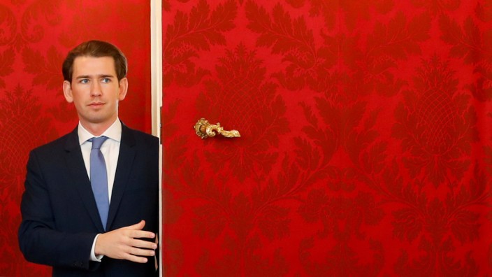 Head of People's Party Sebastian Kurz leaves after his meeting with Austria's President Alexander Van der Bellen and head of the Green Party Werner Kogler at the presidential office in Vienna
