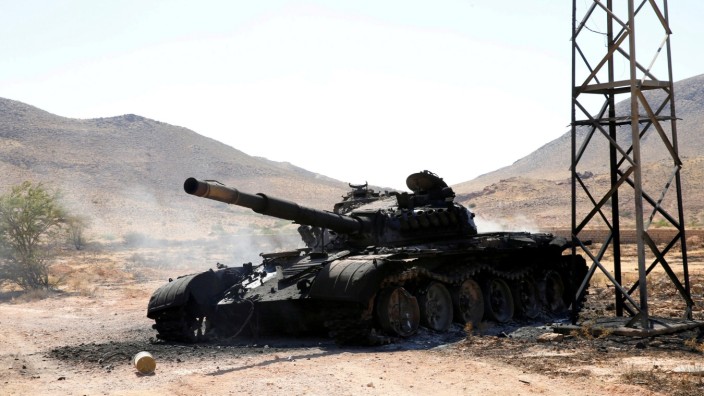 FILE PHOTO: A destroyed and burnt tank, that belongs to the eastern forces led by Khalifa Haftar, is seen in Gharyan south of Tripoli