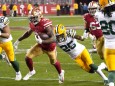 San Francisco 49ers running back Raheem Mostert scores on a 22 yard run against the Green Bay Packers in the third quar