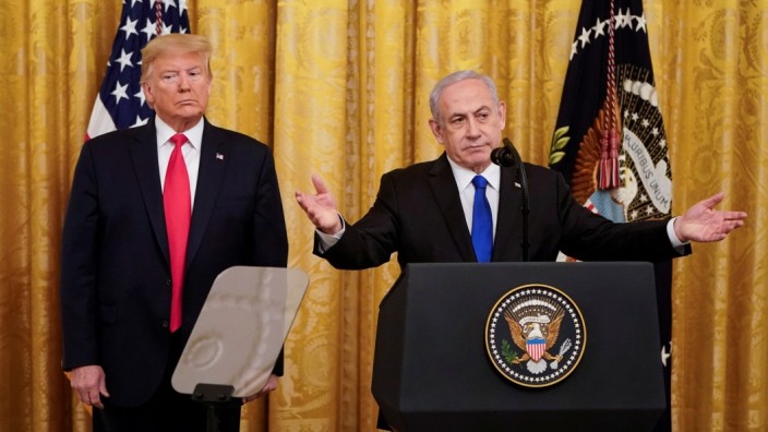 U.S. President Trump and Israel's Prime Mininister Netanyahu deliver remarks on Middle East peace plan proposal at the White House in WashingtonâÄ¨