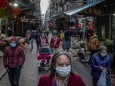 Menschen in Macau nach Ausbruch des Coronavirus