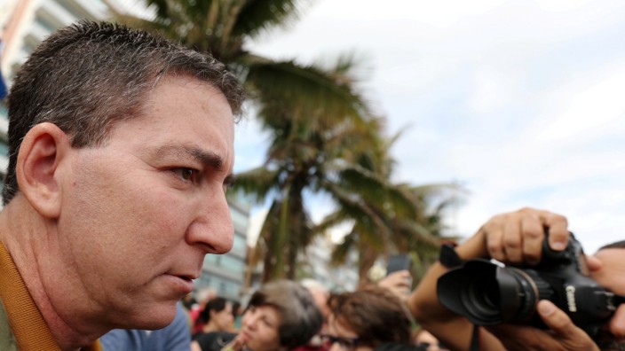 FILE PHOTO: Greenwald is seen during the demonstration to demand more protection for the Amazon rainforest, in Rio de Janeiro
