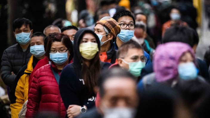 Coronavirus: In Hongkong gehören Masken derzeit wieder zum Straßenbild.