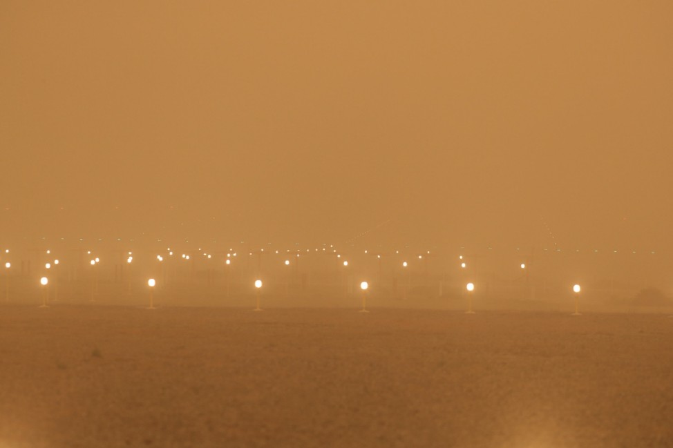 A view of the runway during a sandstorm blown over from North Africa known as 'calima' at Las Palmas Airport