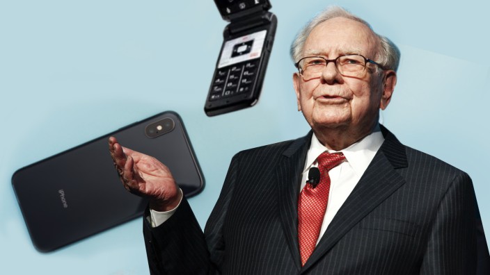 Investor mit Smartphone: Warren Buffett, einer der reichsten Menschen der Welt, kokettiert gerne damit, altmodisch zu sein.