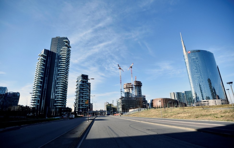 Empty streets are seen after the Italian government imposed a virtual lockdown on the north of the country, in Milan