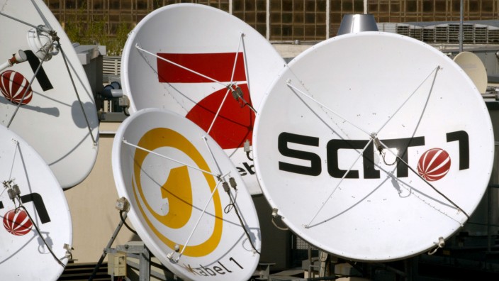 FILE PHOTO: Satellite dishes of the German television stations Kabel 1, SAT 1 and Pro Sieben.