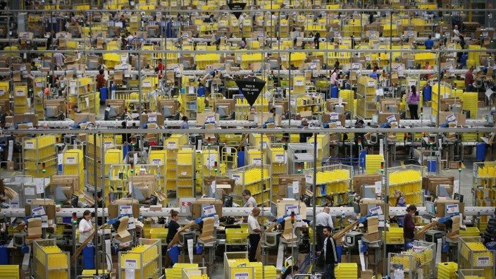 FILE: Workers At Amazon's UK Warehouses Told To Work Overtime To Tackle Huge Demand Due To The Coronavirus Pandemic
