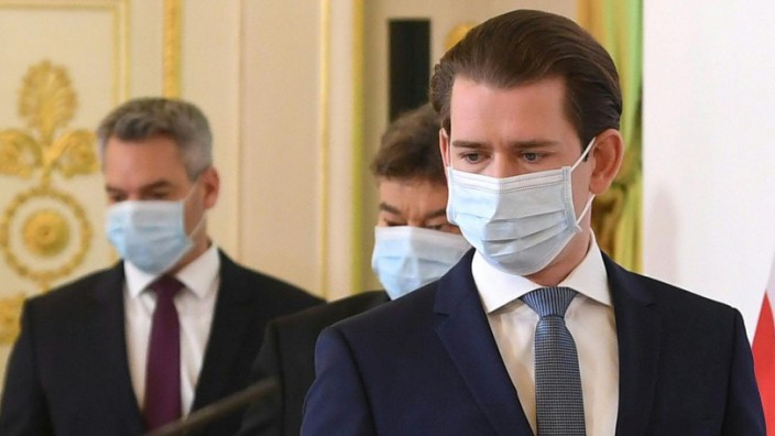 Austrian Chancellor Sebastian Kurz and Ministers arrive for a news conference in Vienna
