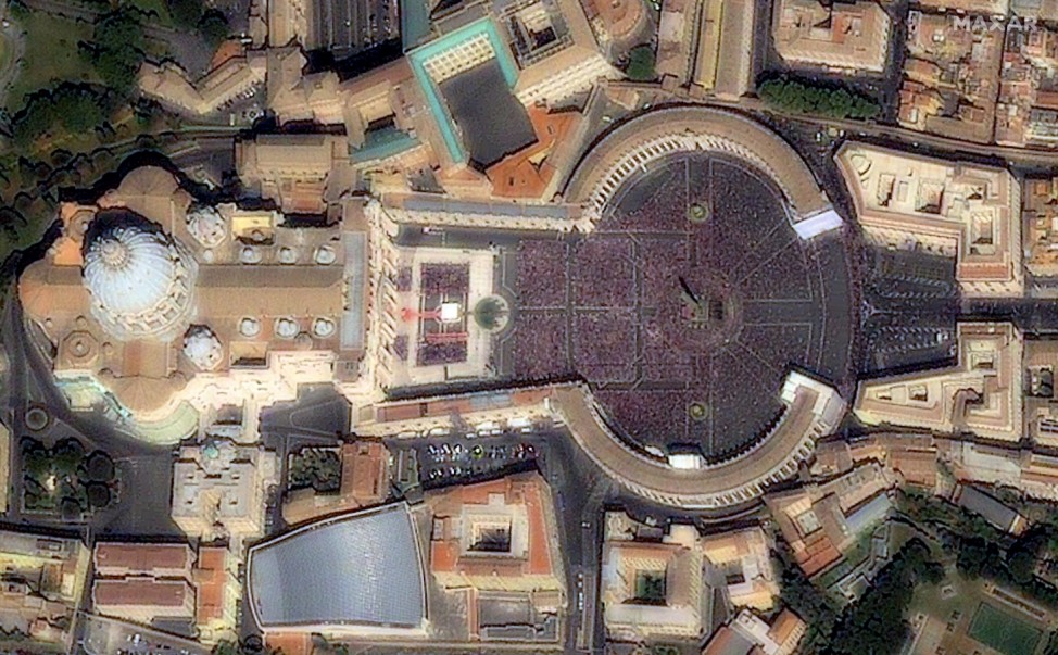 A view of St. PeterâÄÖs Square and the Basilica is seen during Mass on Palm Sunday in Vatican City, April 13, 2011 in this handout satellite image