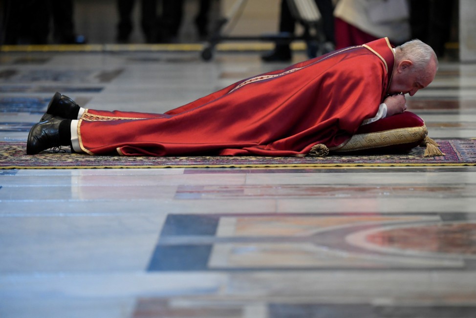 Pope Francis celebrates the Good Friday Passion of the Lord in St. Peter's Basilica at the Vatican