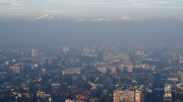 FILE PHOTO: Italian Alps are seen amidst dense fog and smog in Milan
