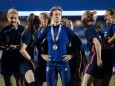 FRISCO, TX - MARCH 11: USA midfielder Megan Rapinoe ( 15) looks out at the crowd after receiving her championship medal
