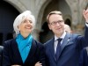 FILE PHOTO: International Monetary Fund (IMF) Managing Director Lagarde listens to German Bundesbank President Weidmann as they pose for a family picture in Palace Chapel during the G7 finance ministers and central bankers meeting in Dresden