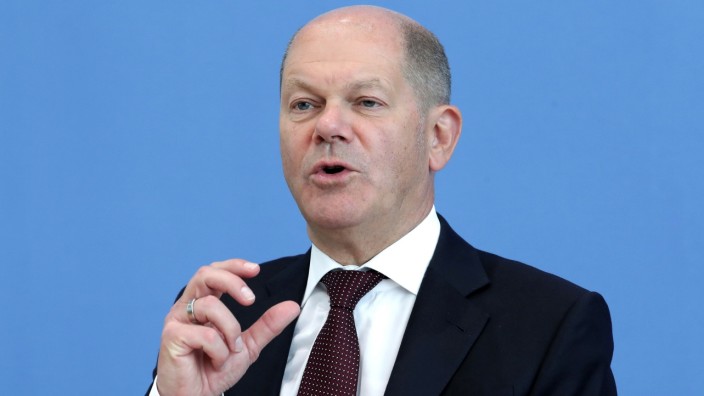 German Finance Minister Olaf Scholz atends a news conference in Berlin