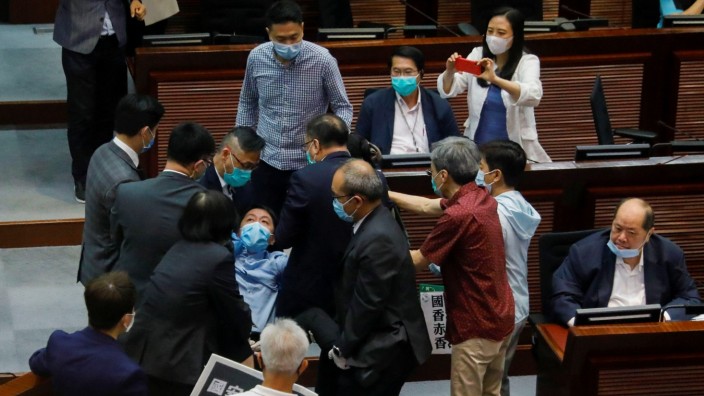 Protest against new security laws during Legislative CouncilâÄÖs House Committee meeting, in Hong Kong